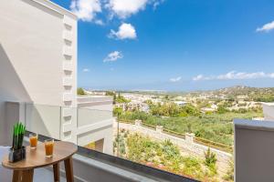 A balcony or terrace at Ino Villa, Unique Group Gatherings, By ThinkVilla