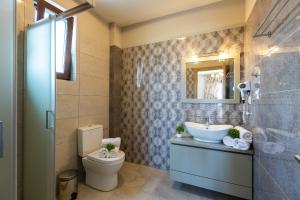 A bathroom at Ino Villa, Unique Group Gatherings, By ThinkVilla