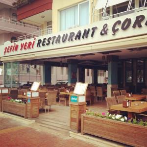 A restaurant or other place to eat at Magi Apart Hotel