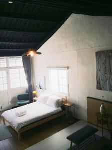 Postel nebo postele na pokoji v ubytování XiaoBei Home2