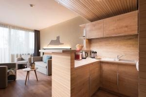 Kuchyň nebo kuchyňský kout v ubytování Pangea Hotel