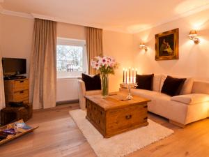 Televízia a/alebo spoločenská miestnosť v ubytovaní Serviced Apartments VILLA LICHT