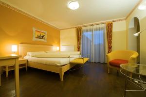 Postel nebo postele na pokoji v ubytování Bio-Hotel Schiessentobel + 32 fotografií