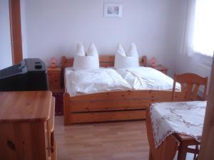 Postel nebo postele na pokoji v ubytování Harzer Ferienpension + 24 fotografií