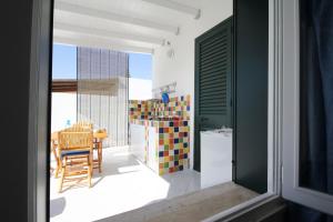 A kitchen or kitchenette at B&B Villa Genny a pochi passi dal mare