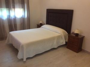 Postel nebo postele na pokoji v ubytování Hostal Mont Royal