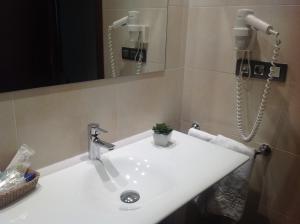 Koupelna v ubytování Hotel Pago del Olivo