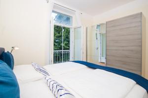 A bed or beds in a room at Residence Diana