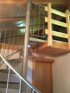Palanda nebo palandy na pokoji v ubytování Chalet Marina