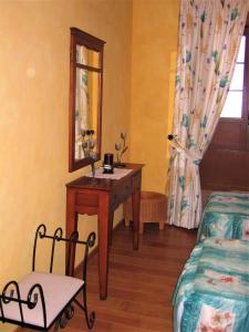 Postel nebo postele na pokoji v ubytování Histórica Casa de la Oje