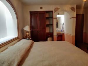 Postel nebo postele na pokoji v ubytování Hotel Posada Maria Bonita