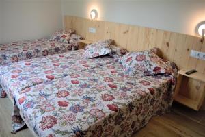 Postel nebo postele na pokoji v ubytování B&B LOS LLANOS