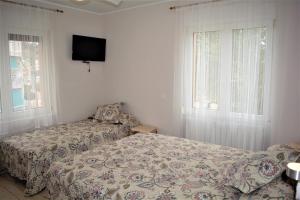 Postel nebo postele na pokoji v ubytování B&B LOS LLANOS