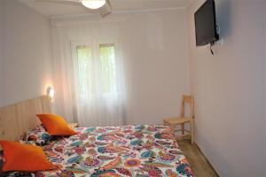 Postel nebo postele na pokoji v ubytování B&B LOS LLANOS