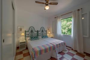 Ένα ή περισσότερα κρεβάτια σε δωμάτιο στο VILLA ALONDRA B6 +35 φωτογραφίες