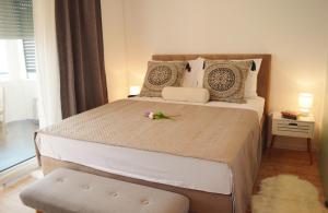 Łóżko lub łóżka w pokoju w obiekcie Nirvana Crikvenica - 2