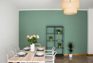 a dining room with a table and chairs at Piedaterre sulle Mura - Treviso to Venice in Treviso