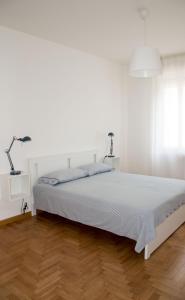 Piedaterre sulle Mura - Treviso to Venice tesisinde bir odada yatak veya yataklar