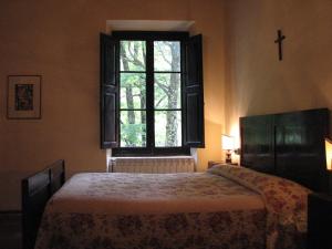 Posteľ alebo postele v izbe v ubytovaní Locanda Dei Baroni - Antica Dimora