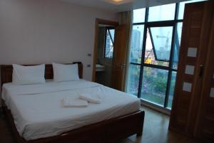 Voodi või voodid majutusasutuse Nice Hotel toas