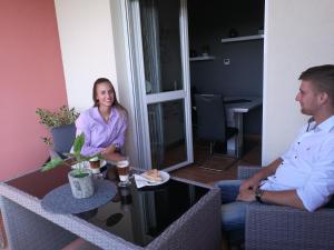 Hostia v ubytovaní Csabai Apartman