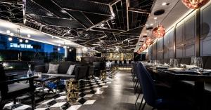Ein Restaurant oder anderes Speiselokal in der Unterkunft Hotel COZi Oasis 
