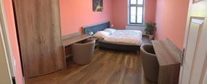 Postel nebo postele na pokoji v ubytování Apartament Kleopatra