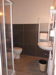 Koupelna v ubytování Hotel Cecco