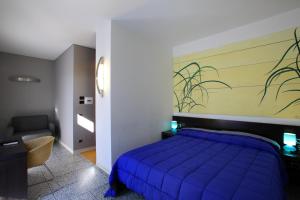Postel nebo postele na pokoji v ubytování Hotel Zeffiro + 24 fotografií