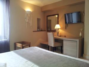 Letto o letti in una camera di Hotel Al Convento
