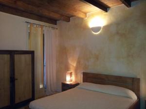 Letto o letti in una camera di Hotel Al Convento