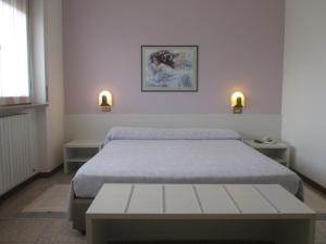 Hotel O'Scugnizzo 2 tesisinde bir odada yatak veya yataklar