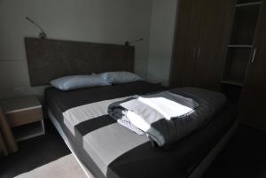 Posteľ alebo postele v izbe v ubytovaní Camping Venezia Village