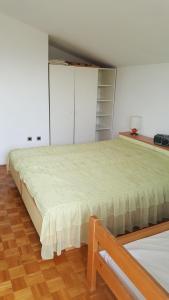 Postel nebo postele na pokoji v ubytování 20mToTheSea