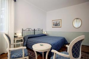 Een bed of bedden in een kamer bij Ca' San Rocco