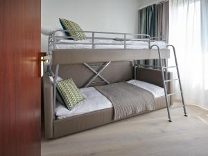 Cama ou camas em um quarto em Hotel Suisse