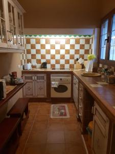 Kuchyň nebo kuchyňský kout v ubytování Casita del Medianero