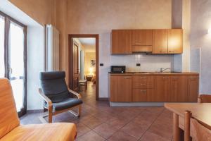 A kitchen or kitchenette at Residence La Tana del Ghiro