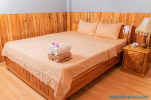 Posteľ alebo postele v izbe v ubytovaní Orchard Fruit Farm Bungalow