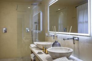 Koupelna v ubytování Hotel Li Finistreddi