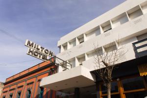 a building with a sign for a million hotel at Hotel Milton in La Paz