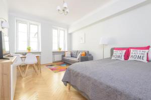 Posteľ alebo postele v izbe v ubytovaní Bright and modern apartment in the heart of the Old and New Town