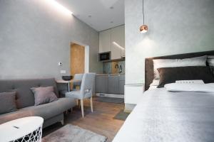 Posteľ alebo postele v izbe v ubytovaní Citylux Apartments