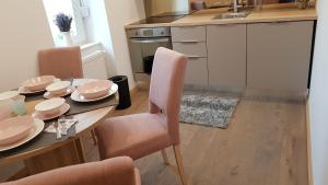 Kuchyňa alebo kuchynka v ubytovaní Citylux Apartments