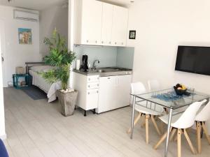 Kuchyň nebo kuchyňský kout v ubytování Apartment Marina
