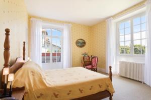 Ein Bett oder Betten in einem Zimmer der Unterkunft Hotel Les Goelands