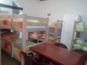 Ένα ή περισσότερα κρεβάτια σε δωμάτιο στο Hostel Corner 021
