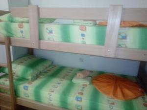 Ένα ή περισσότερα κρεβάτια σε δωμάτιο στο Hostel Corner 021