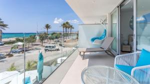 a balcony with a view of the ocean at The Hype Beachhouse in Playa de Palma