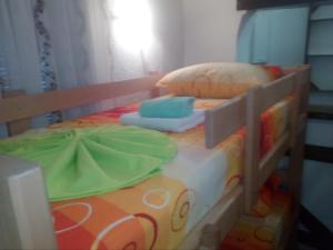 Ένα ή περισσότερα κρεβάτια σε δωμάτιο στο Hostel Corner 021
